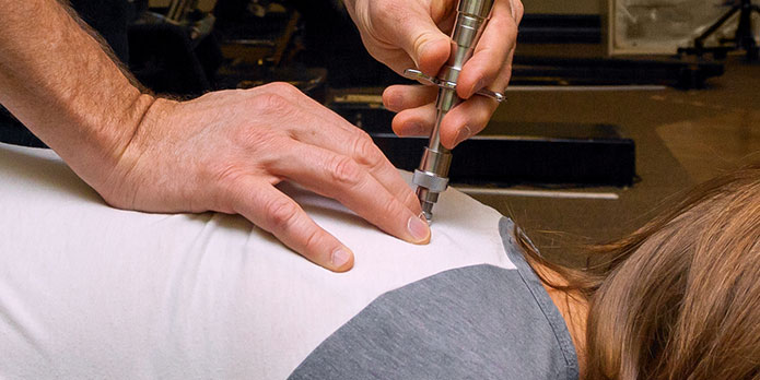 patient getting activator methods as an auto accident injury treatment in Fort Lauderdale