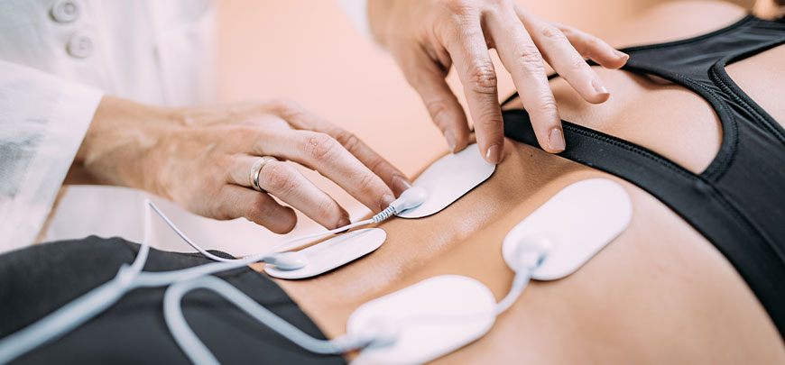 Patient receiving Electrical Muscle Stimulation in Tamarac for auto accident injury relief