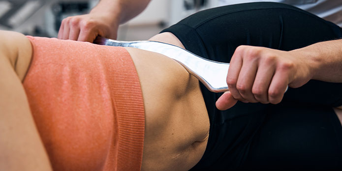 patient getting graston chiropractic as an auto accident injury treatment in Fort Lauderdale