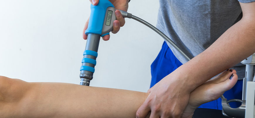 Patient receiving Shockwave Therapy in Tamarac for auto accident injury relief